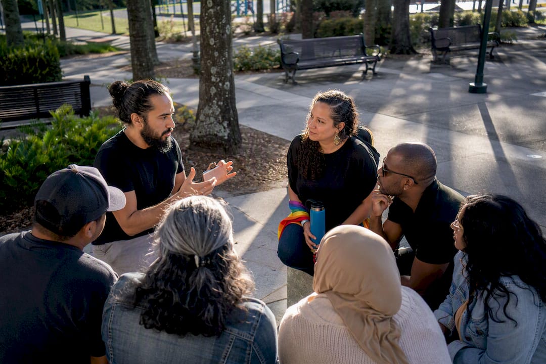 Facilitator leading an outdoor public art session
