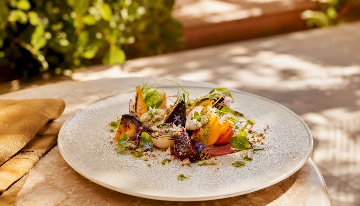 Colorful vegetarian plated dish close-up overhead