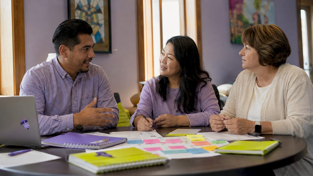 Diverse church leaders collaborating on project