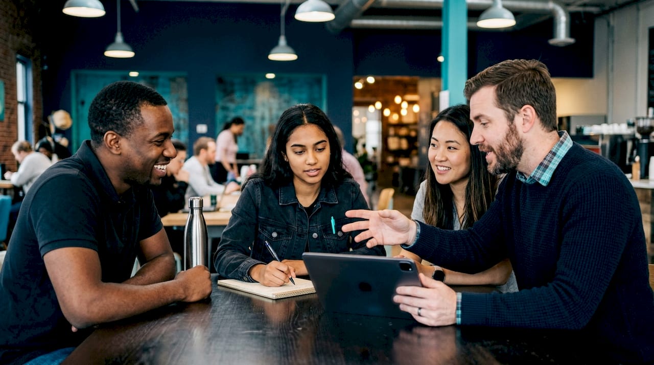 Small business team collaborating on time tracking