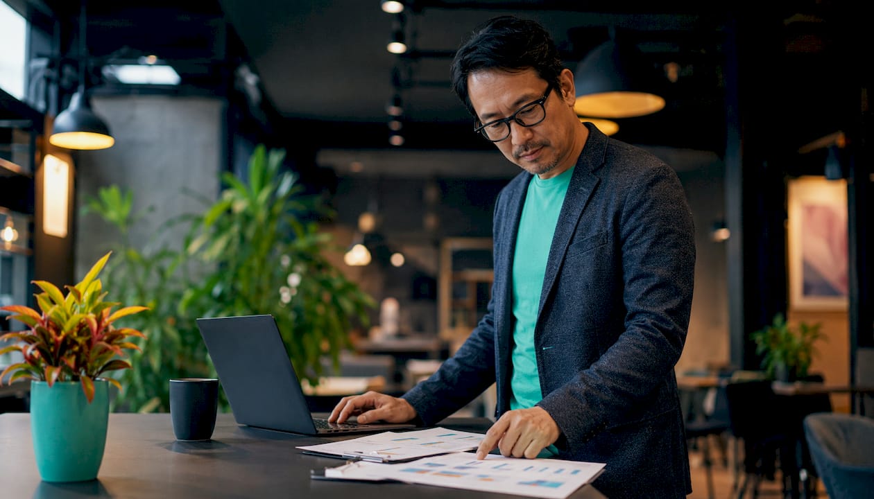 Man working on centralized scheduling platform