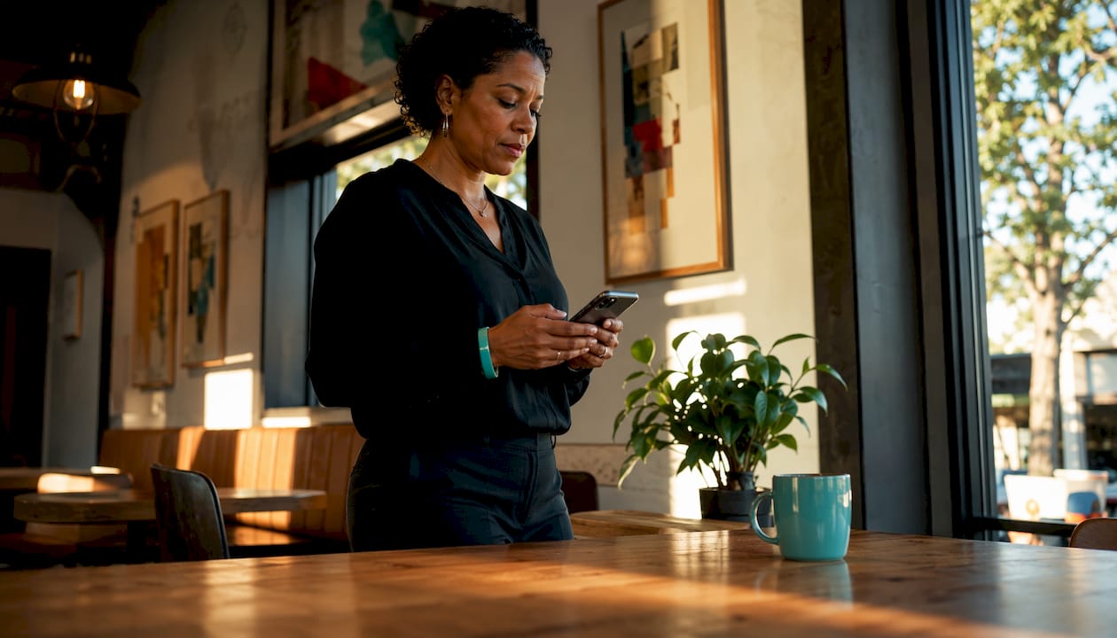 Employee using scheduling app on smartphone