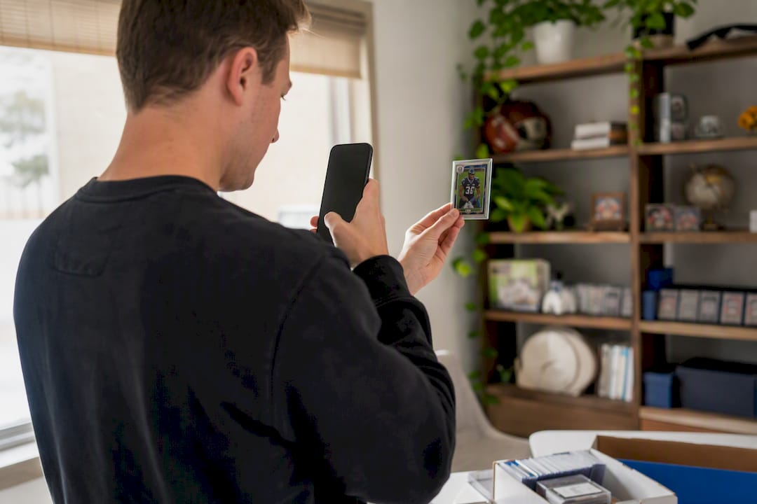 Hands scanning card with smartphone camera