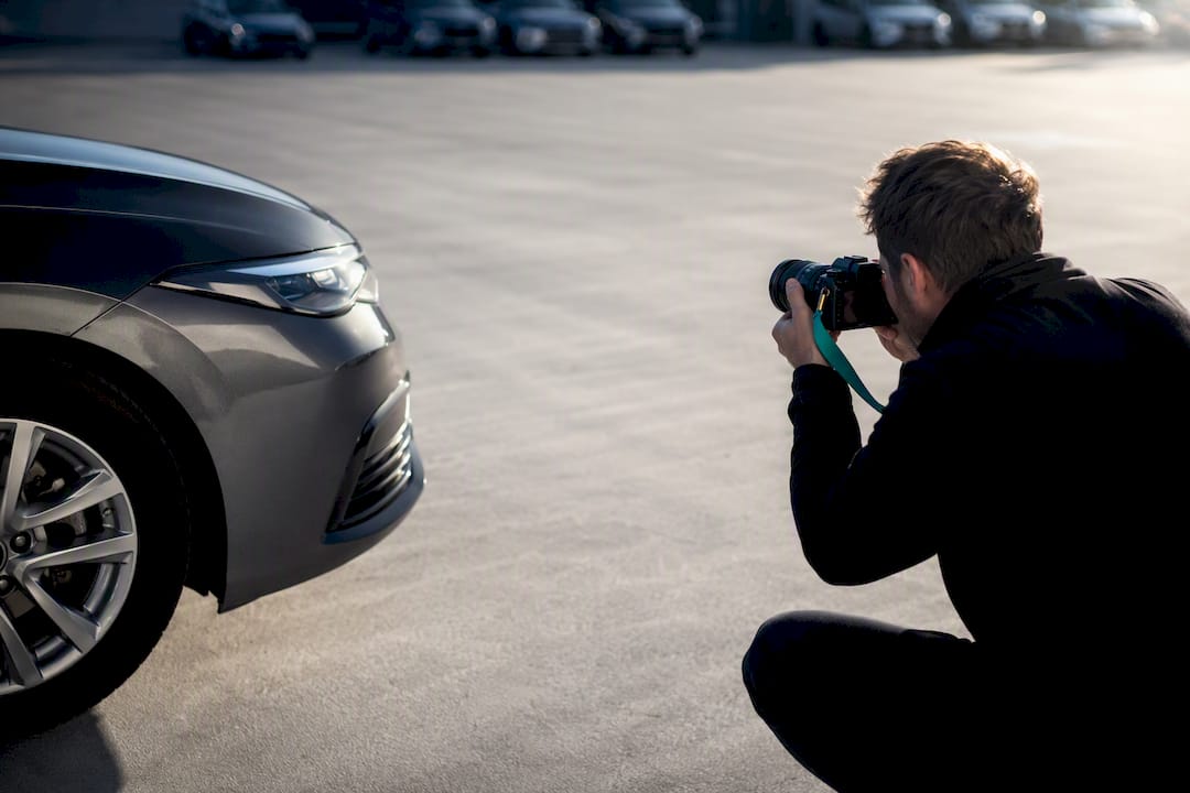 Dealer photographing anonymous vehicle listing