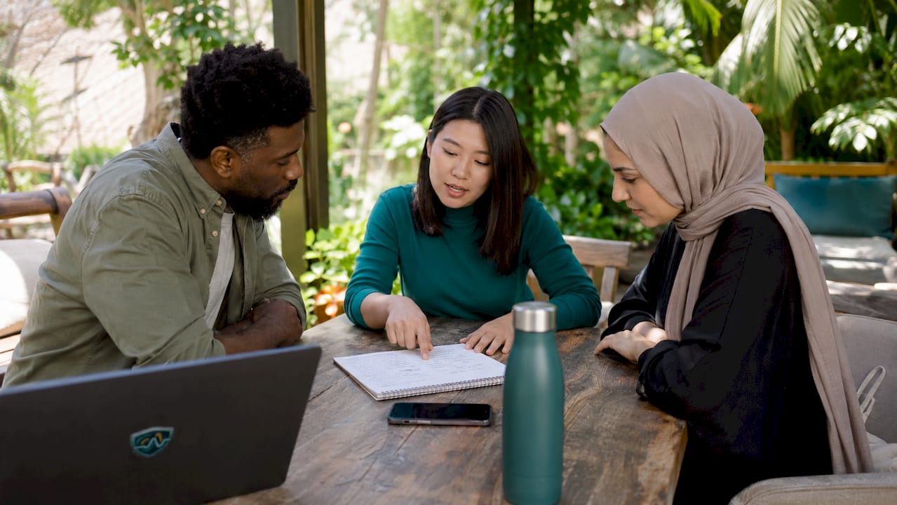 Diverse team discussing biometric consent