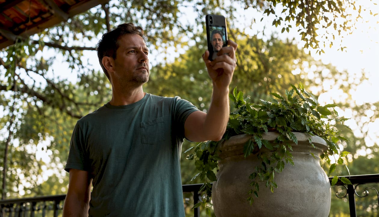 Man taking pre-Botox selfie at home