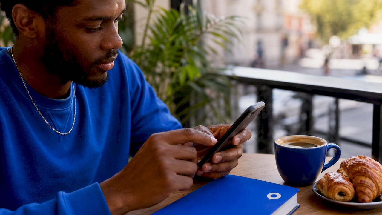 Man activating WhatsApp message translation