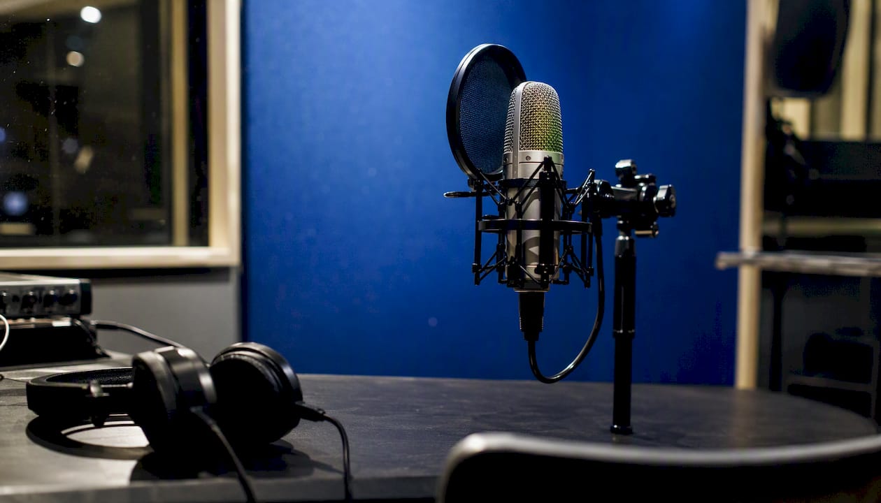 Microphone in recording booth setup