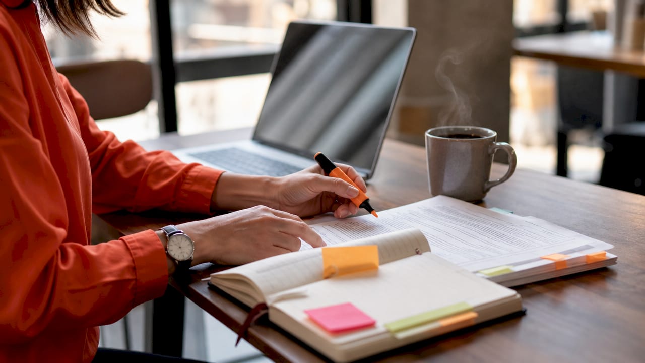 Translator hands revising ISO standard document