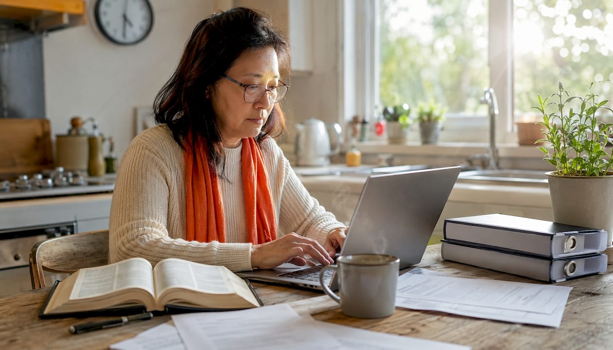 Certified translator working at home office desk