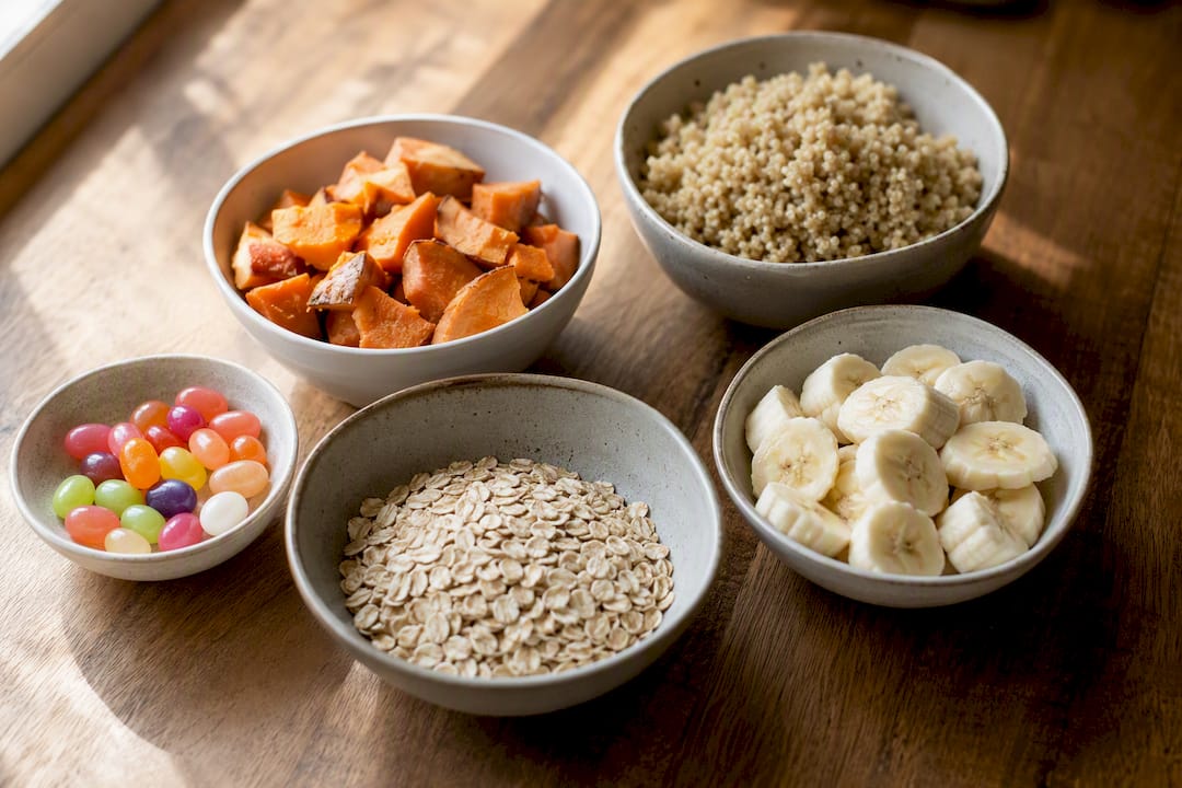 Carbohydrate portions of various real foods on table