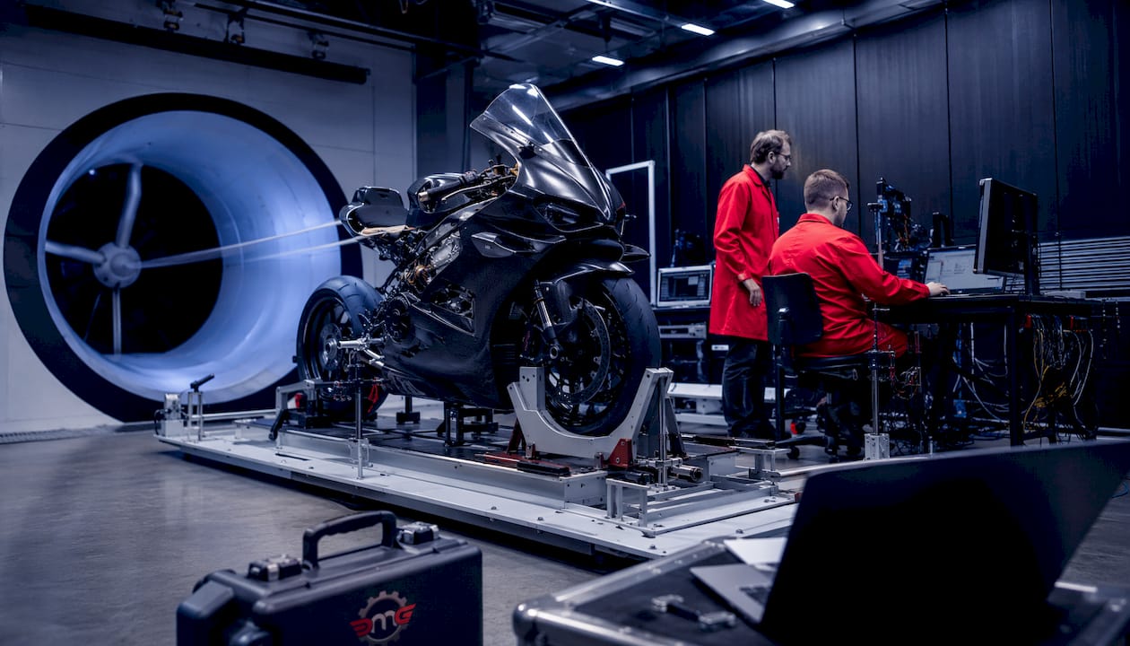 Wind tunnel testing motorcycle stability with engineers