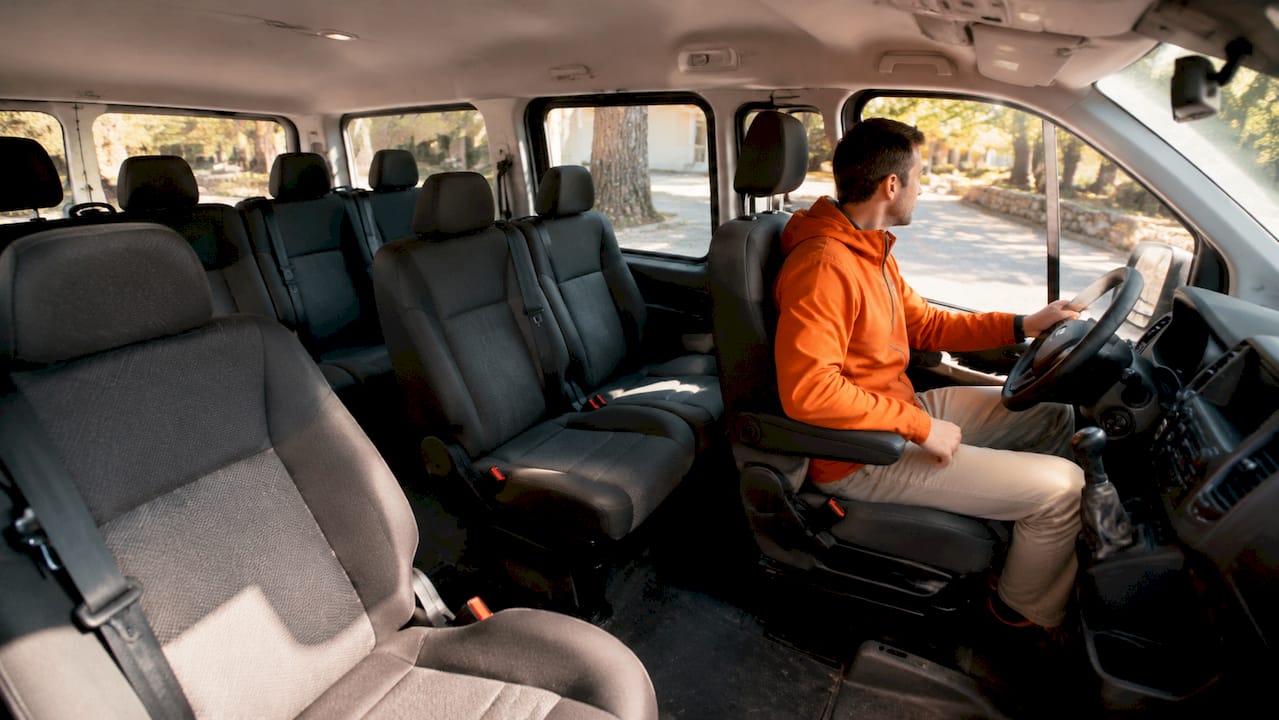 Interior of empty mid-size group rental van