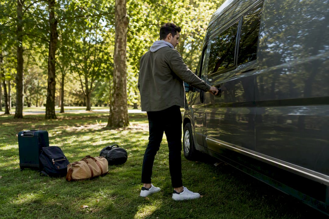 Young driver unlocking large van door