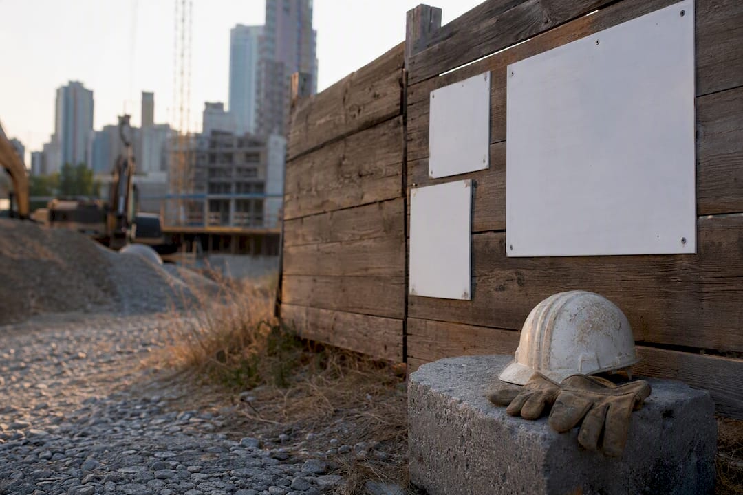 Construction site corner with safety gear and signs