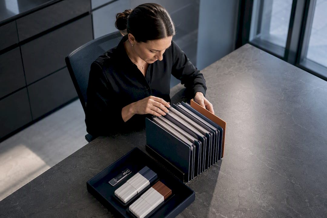 Contractor reviewing vendor compliance records
