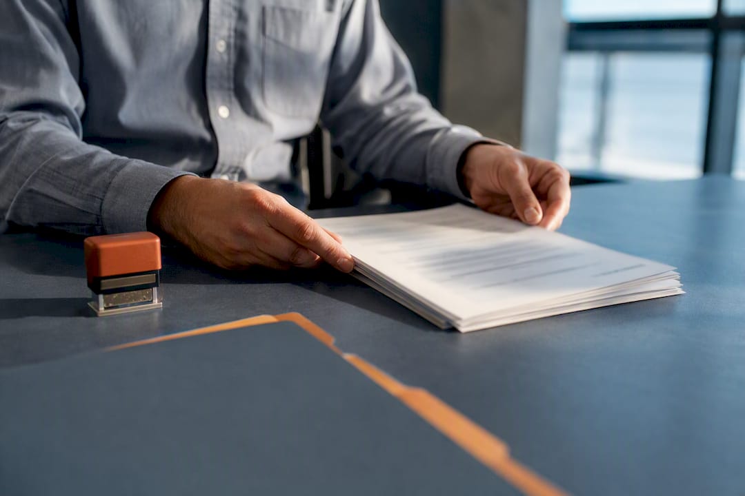 Construction accountant organizing lien waiver documents