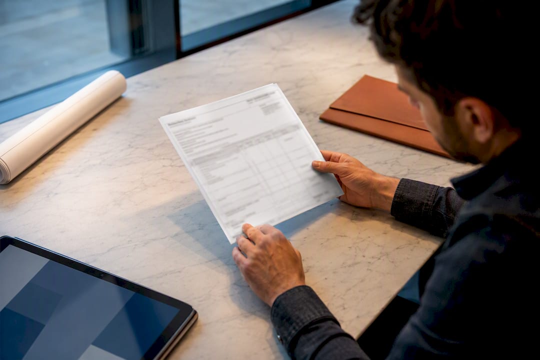 Contractor verifying insurance certificate