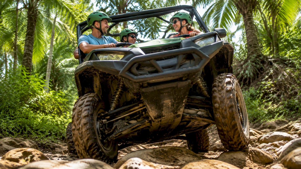 Off-road 4x4 vehicle climbing hill in Phuket