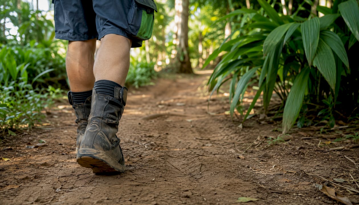 Close-up of off-road riding boots worn indoors