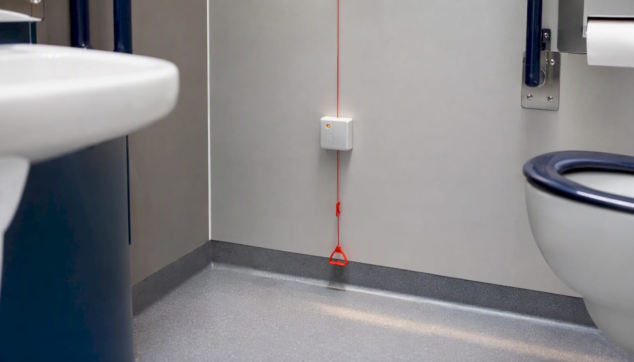 Emergency assistance pull cord in ambulant toilet