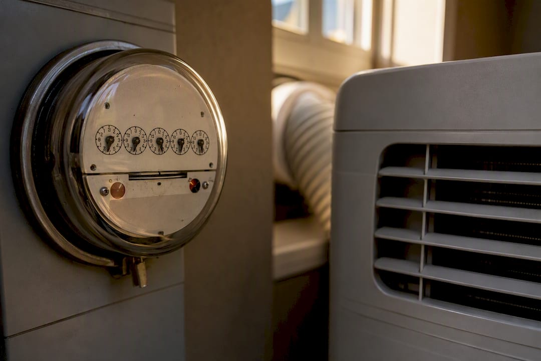 Electricity meter near portable AC compressor vent
