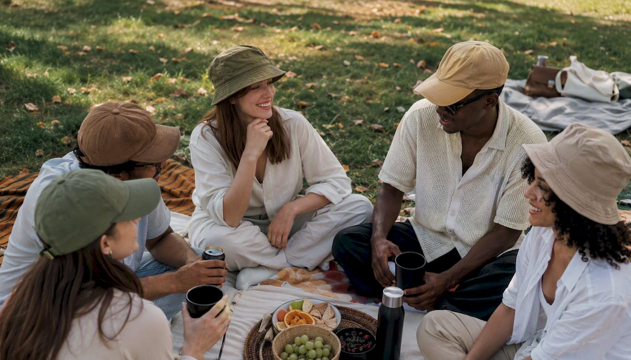 Group wearing caps at casual social outing
