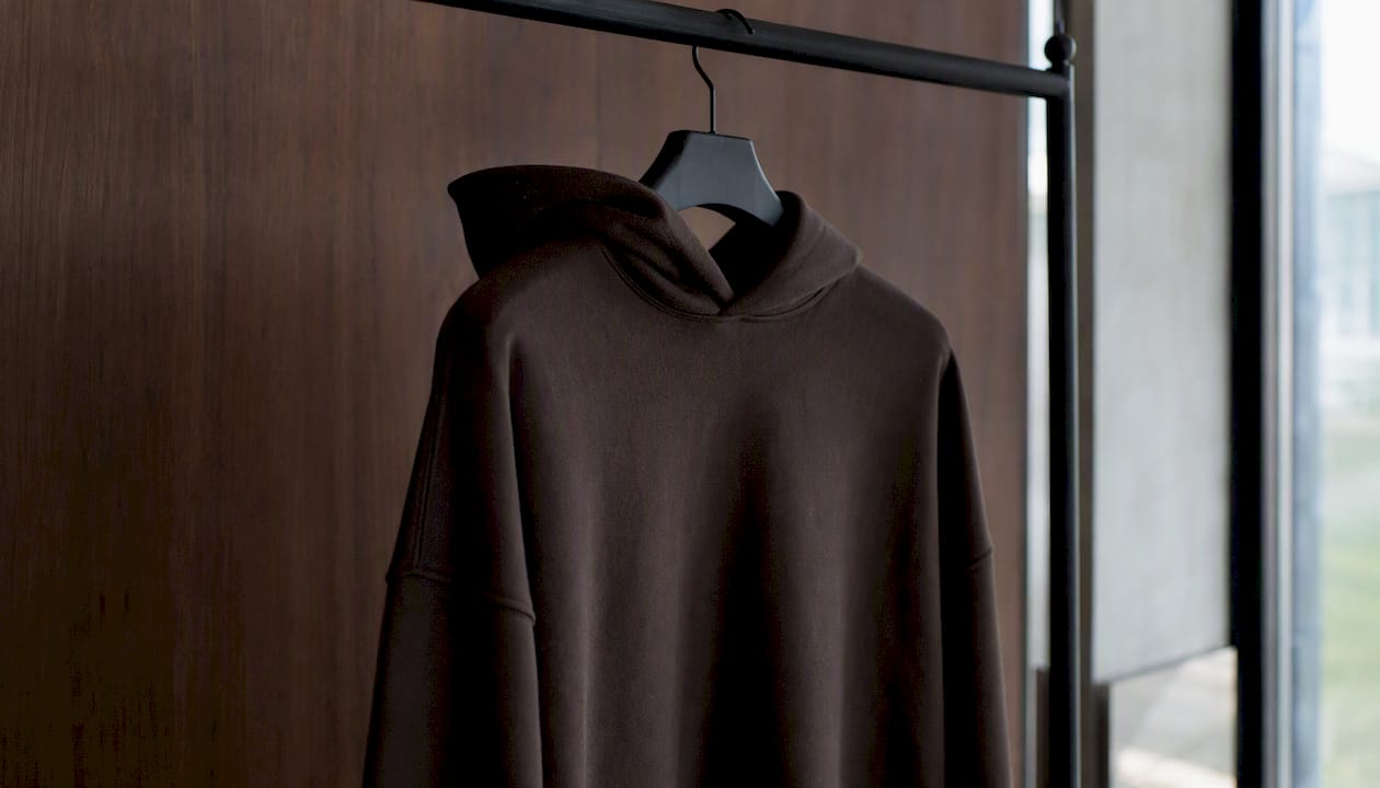 Close-up oversized hoodie sleeve and shoulder