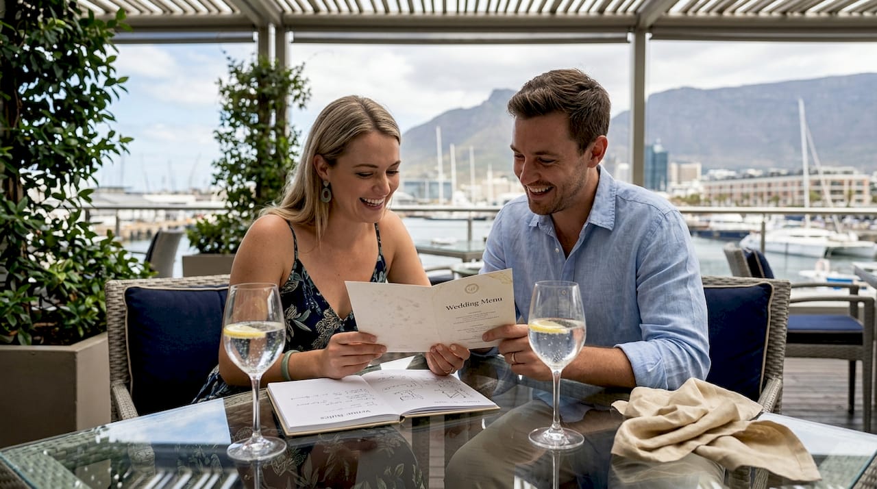 Couple planning event in Cape Town restaurant