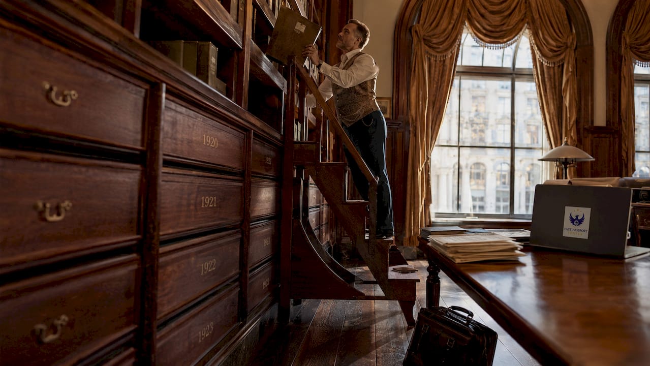 Archivist retrieving historical passport records