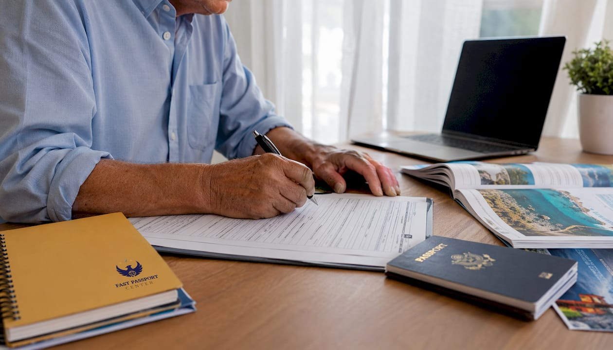 Hands completing passport cancellation form