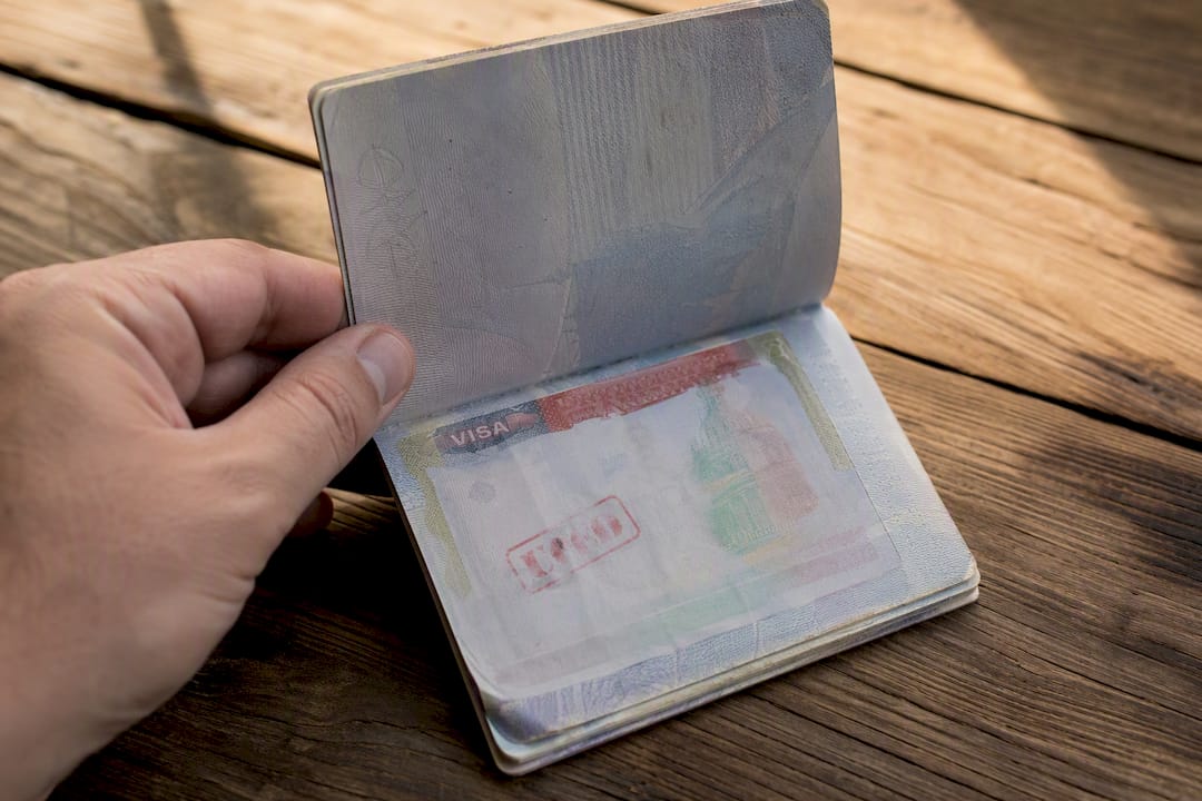 Close-up of valid visa in expired passport