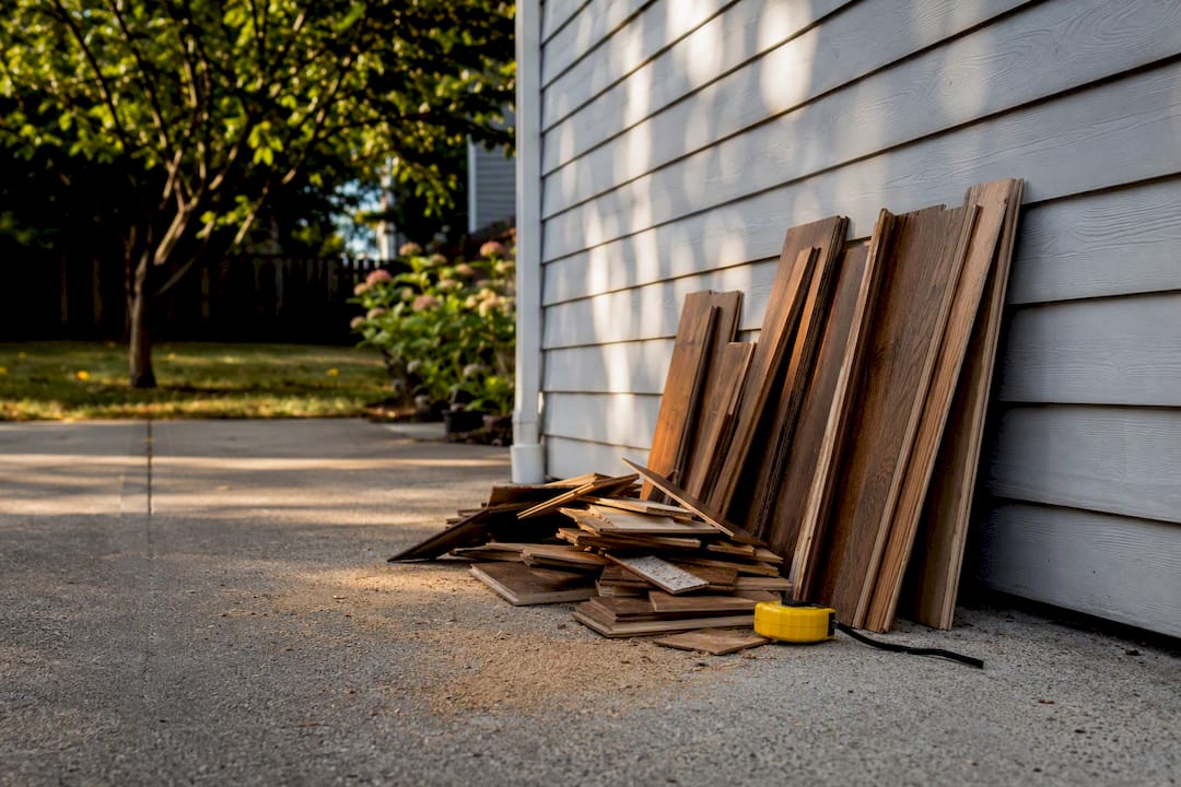 Leftover hardwood flooring materials on floor