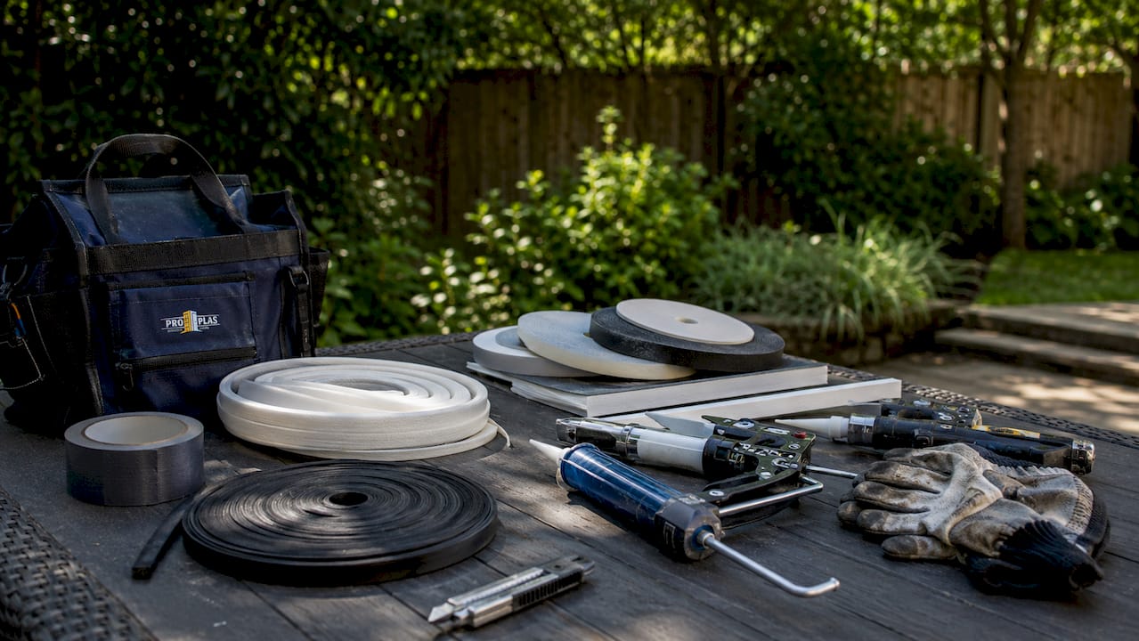 Window sealing materials and tools on workbench