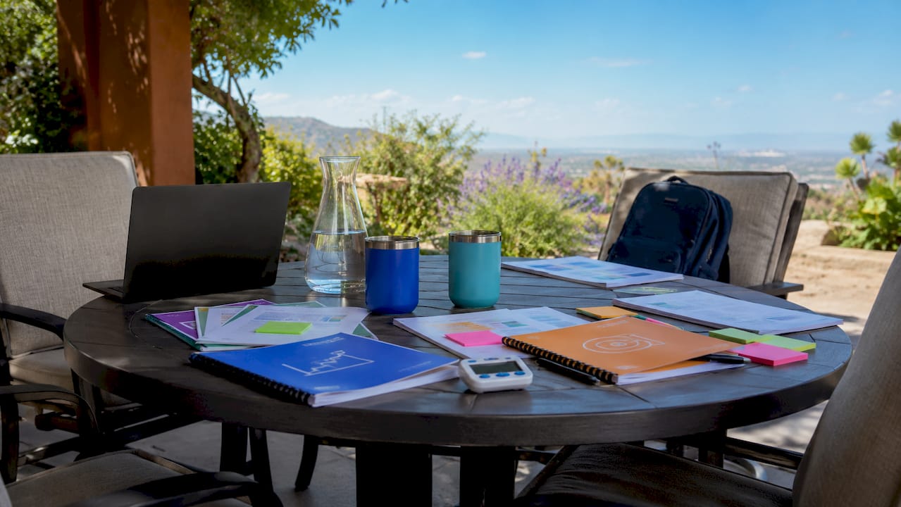 Coaching group session materials on table