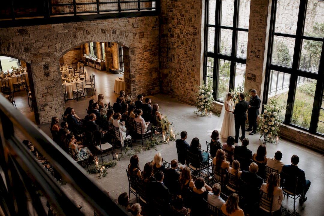 Wedding ceremony inside distinctive venue