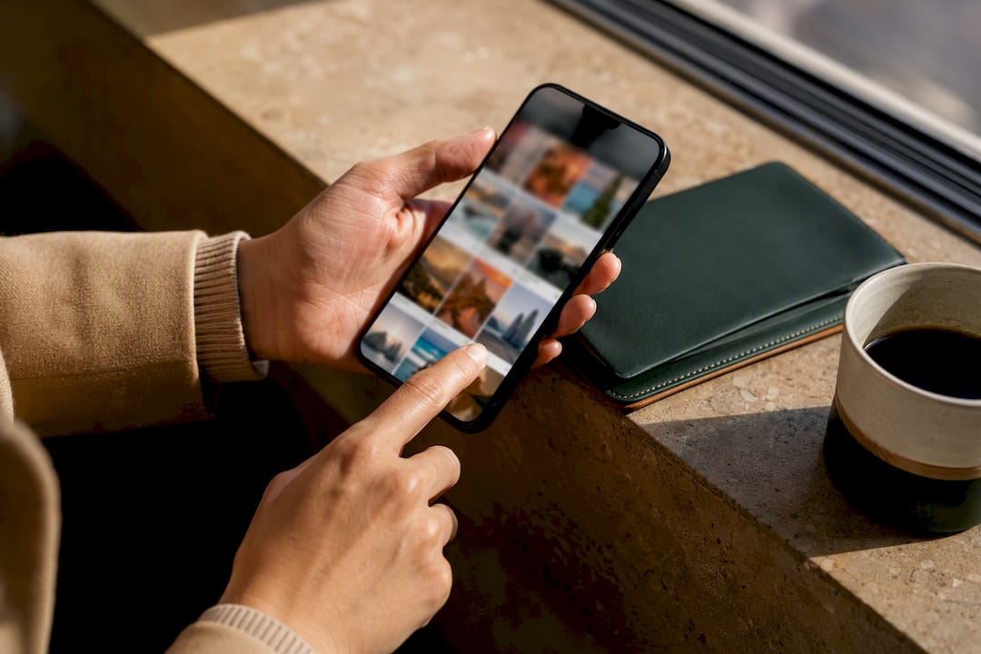 Client reviewing photo proofs on phone