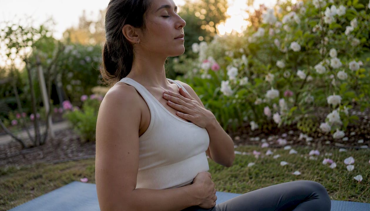 Hands demonstrating belly breathing technique