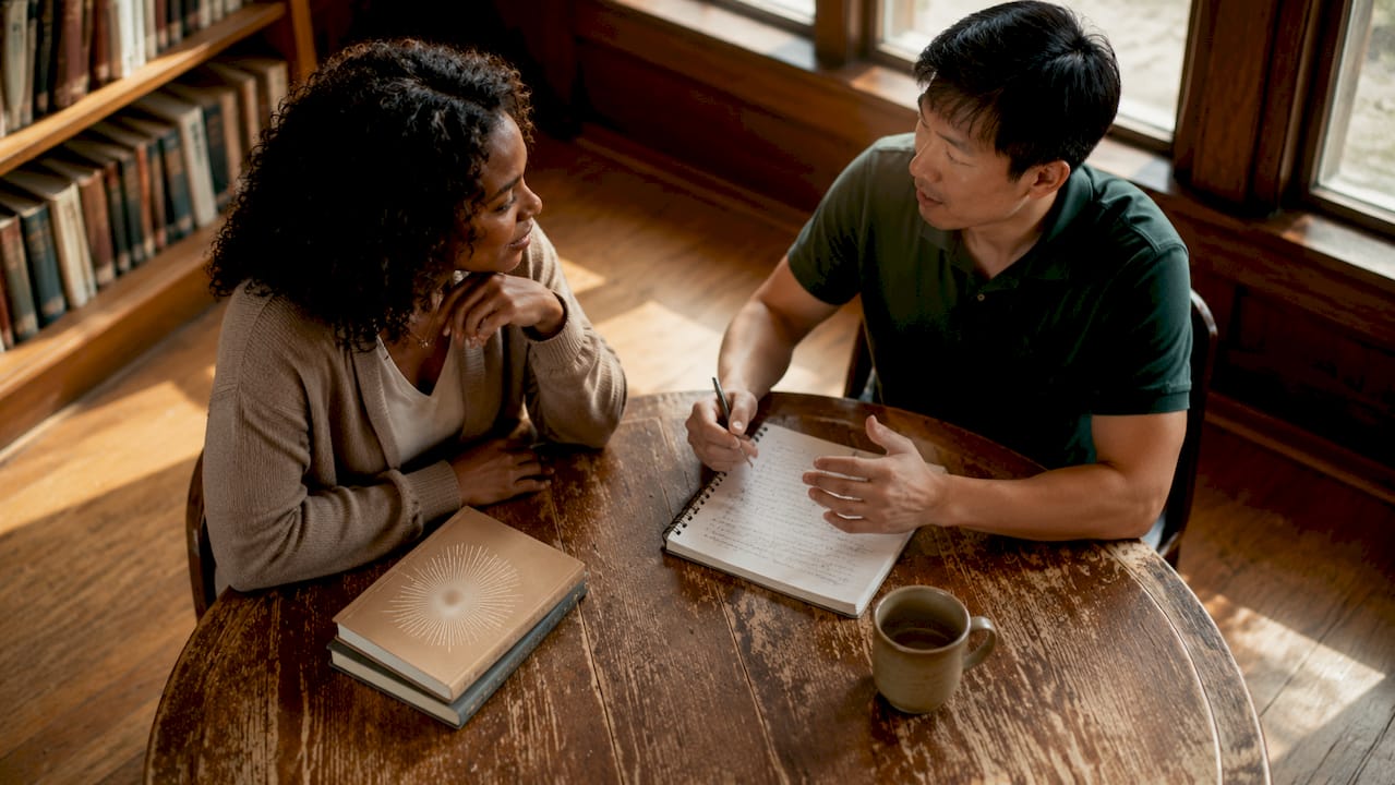 Two practitioners discussing ethical principles
