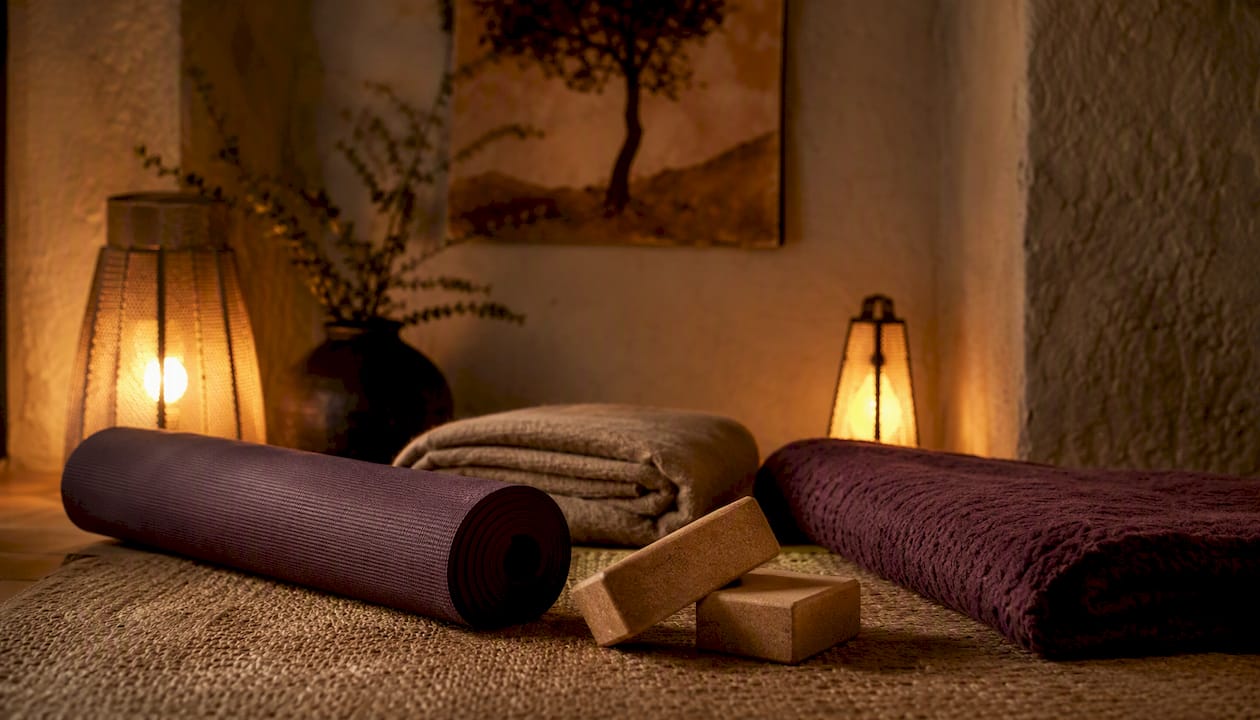 Yoga mat with blankets and blocks ready for practice
