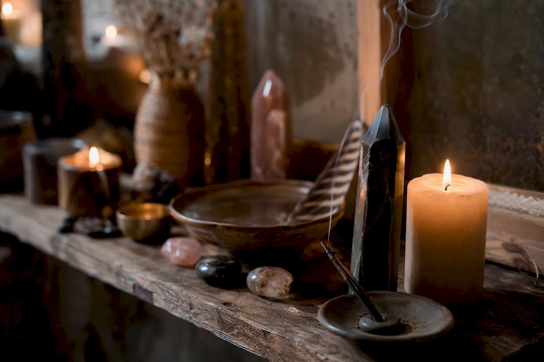 Shamanic altar with candles and crystals