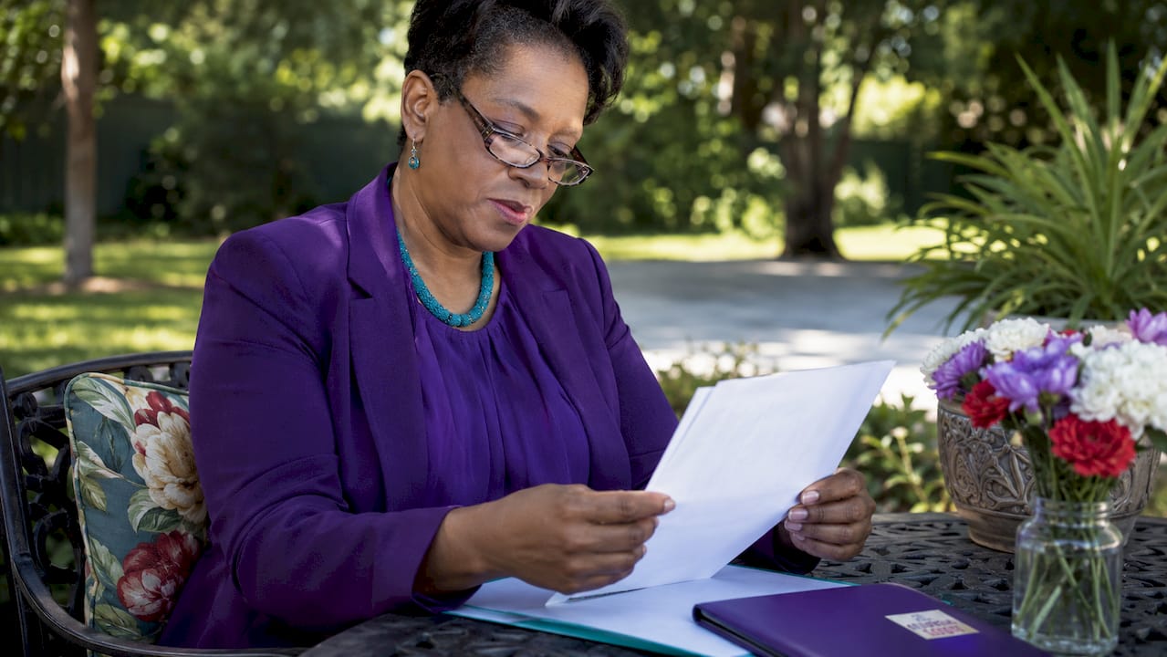Landlord reviewing driveway cleaning estimate papers
