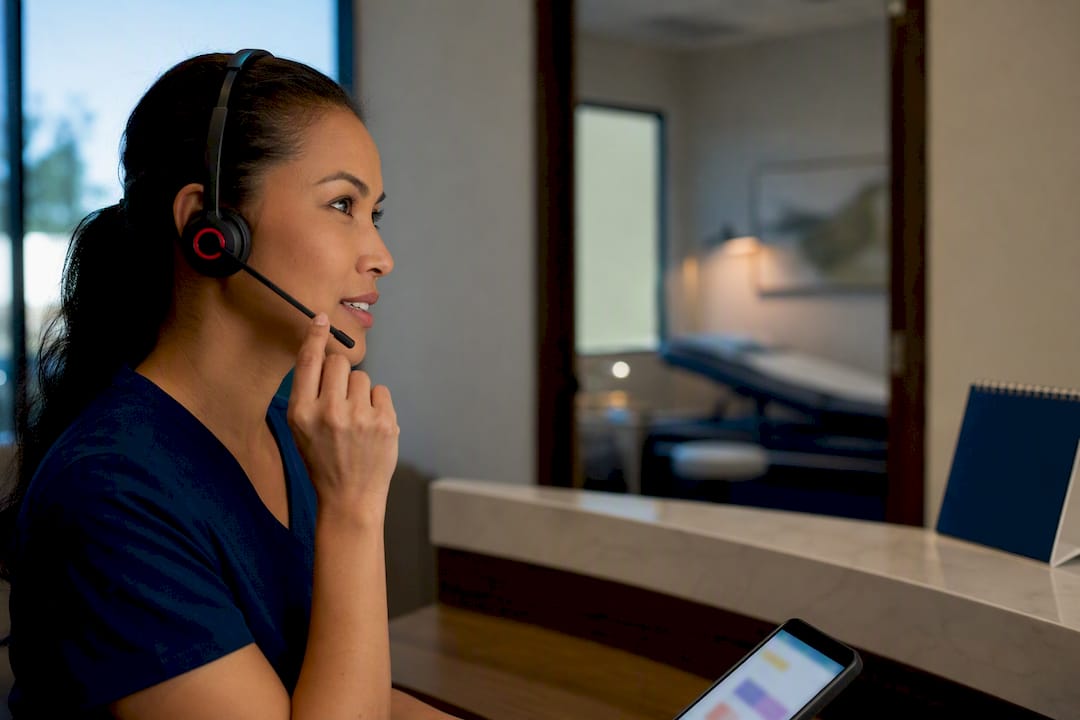 Clinic coordinator arranging an interpreter call