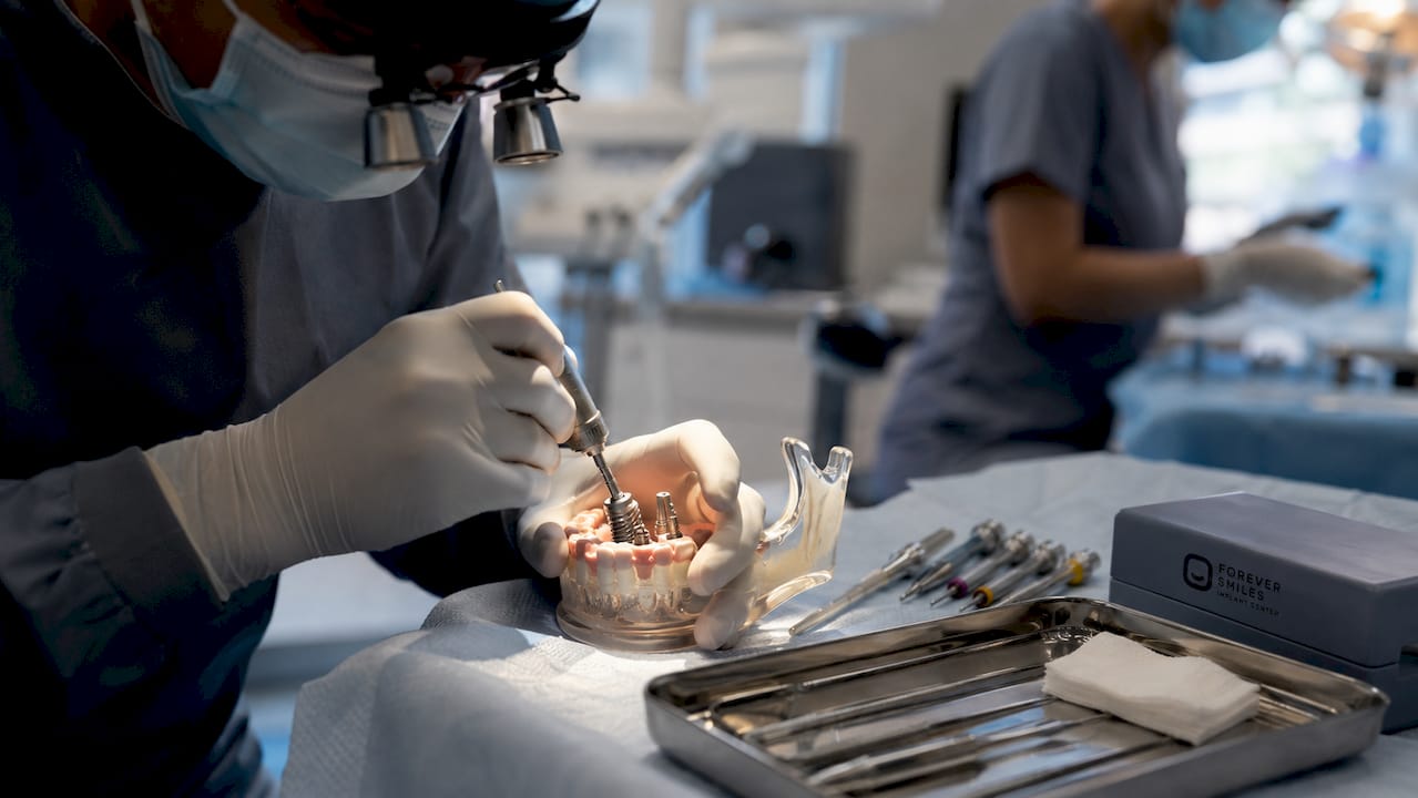 Close-up of All-on-4 implant surgical hands