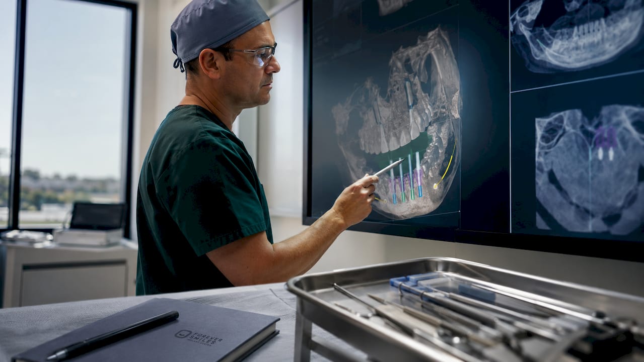 Surgeon digitally planning implants