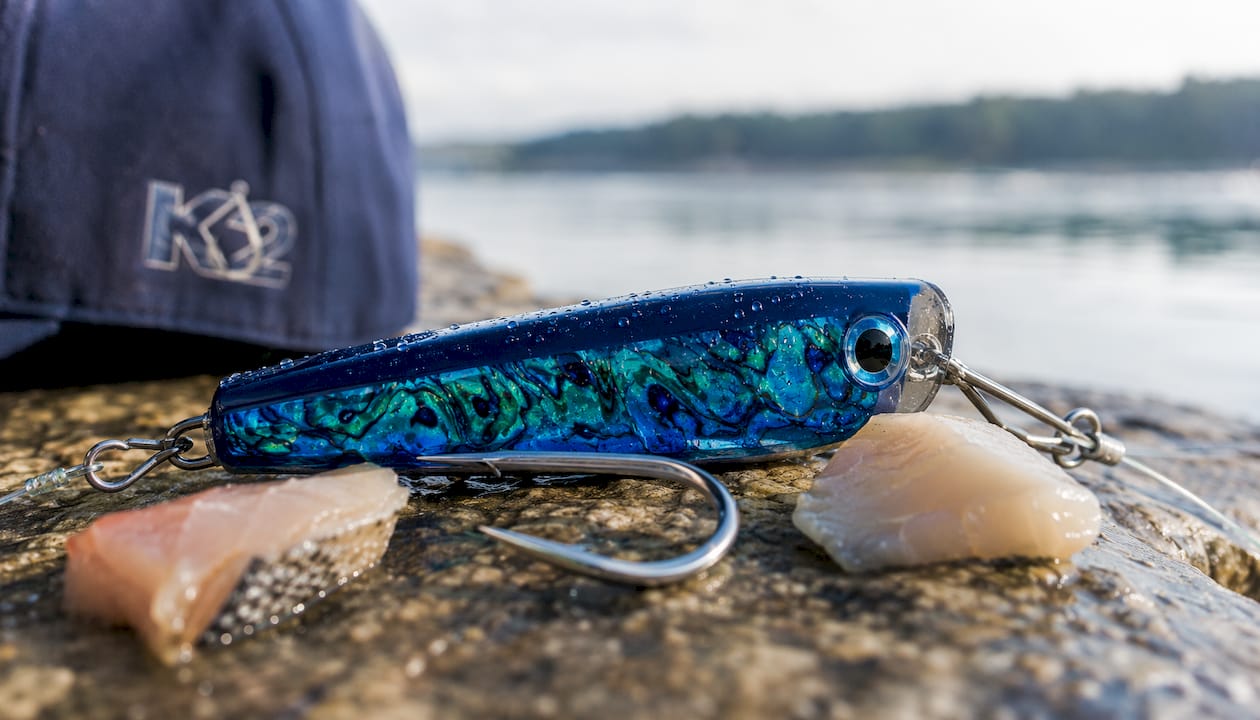 Close-up of shiny offshore trolling lure on wooden dock