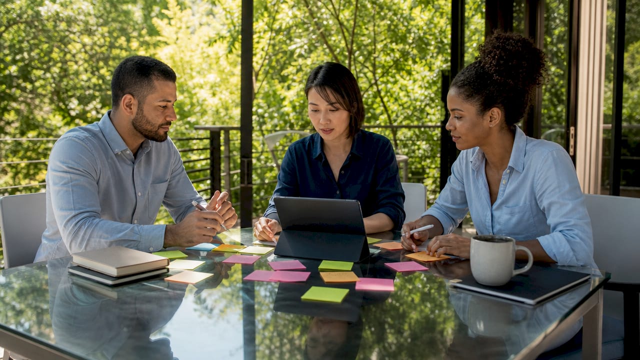 Team handling password notes and security tokens