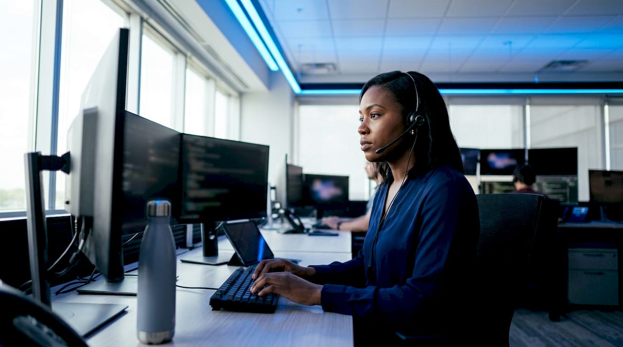 Security analyst monitoring operations center