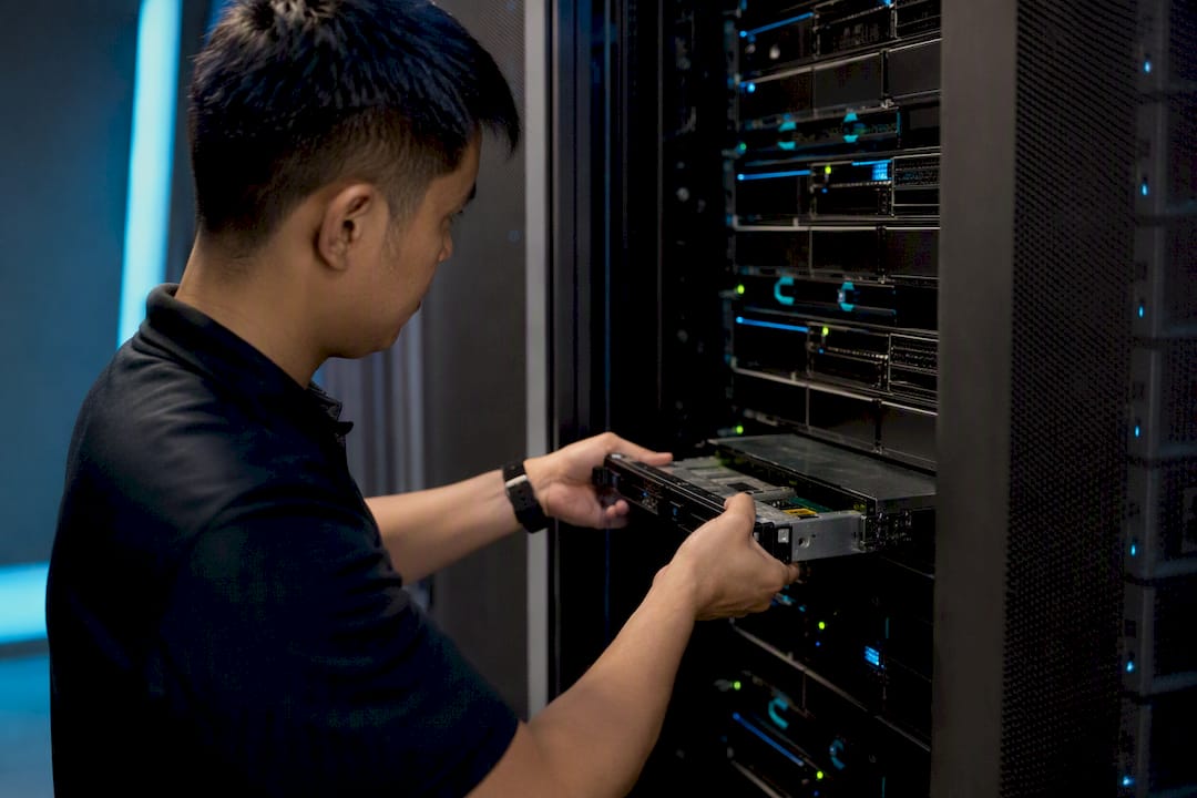 Hands replacing server hardware component
