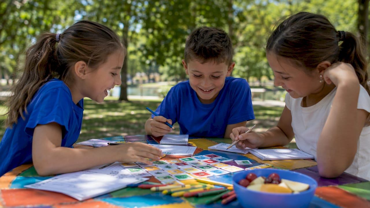 Children playing spelling word game together
